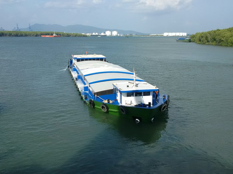 A VIKATRANS barge underway on the river